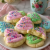Incredibly soft, melt-in-your-mouth sugar cookies made with cream cheese for lasting tenderness. Easy dough, pale and perfect, with optional simple frosting.