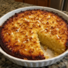 An old-fashioned Impossible Coconut Pie with a golden toasted coconut topping and a rich, buttery custard filling. This easy one-bowl dessert creates its own layers as it bakes and is perfect for holidays, potlucks, or everyday baking.