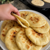 Incredibly soft, pillowy flatbread made on the stovetop in minutes. No long kneading or rising required—just mix, rest, roll, and cook until golden and puffed.