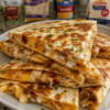 Quick, cheesy quesadillas loaded with ranch-coated chicken, crispy bacon, and two kinds of melted cheese. Ready in about 15 minutes for the ultimate easy weeknight dinner.