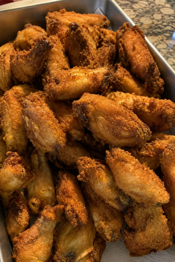 Shatteringly crispy fried chicken wings with a well-seasoned flour-and-cornstarch coating. Juicy inside, crunchy outside, and perfect served plain or with your favorite sauce.