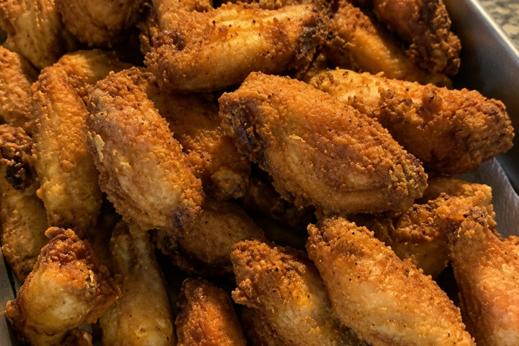 Shatteringly crispy fried chicken wings with a well-seasoned flour-and-cornstarch coating. Juicy inside, crunchy outside, and perfect served plain or with your favorite sauce.