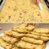 Crispy on the edges, tender in the center, and loaded with potatoes, vegetables, eggs, and melted cheese, this easy sheet pan potato bake is perfect for breakfast, brunch, or a simple family meal.