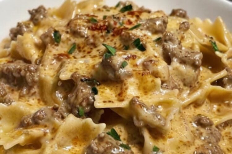 A rich and creamy one-pan pasta made with seasoned ground beef, garlic, Parmesan cheese, and tender bowtie pasta. The perfect comfort food for busy weeknights.