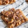 Rich buttery shortbread topped with gooey homemade praline caramel and toasted pecans creates these irresistible pecan pie bars that are perfect for holidays and special occasions.