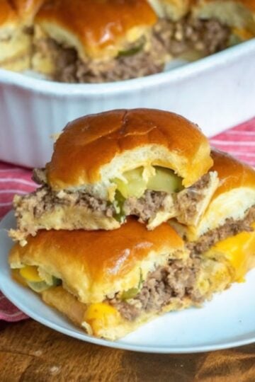 Tender seasoned ground beef layered with melted cheese and tangy pickles inside buttery baked slider buns for the ultimate easy family dinner.