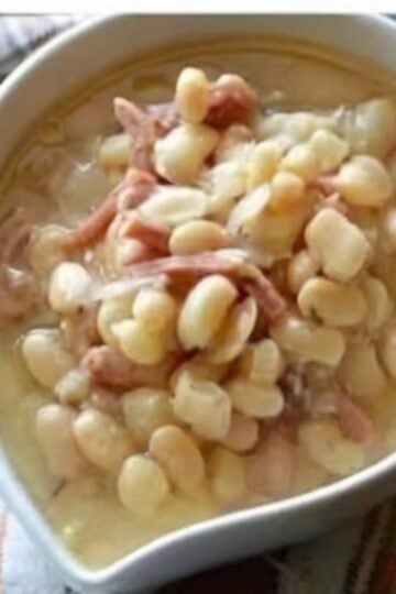 A classic Old-Fashioned Ham and Bean Soup made with tender white beans, smoky ham, onions, garlic, and a rich savory broth. The perfect comforting meal for chilly days.