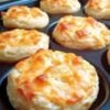 These Sweet Cheddar Bisquick Biscuits are buttery, fluffy, and filled with melted sharp cheddar cheese. Ready in just 20 minutes, they're the perfect homemade addition to breakfast, brunch, soups, chili, or any comforting family meal.