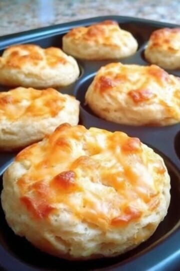 These Sweet Cheddar Bisquick Biscuits are buttery, fluffy, and filled with melted sharp cheddar cheese. Ready in just 20 minutes, they're the perfect homemade addition to breakfast, brunch, soups, chili, or any comforting family meal.
