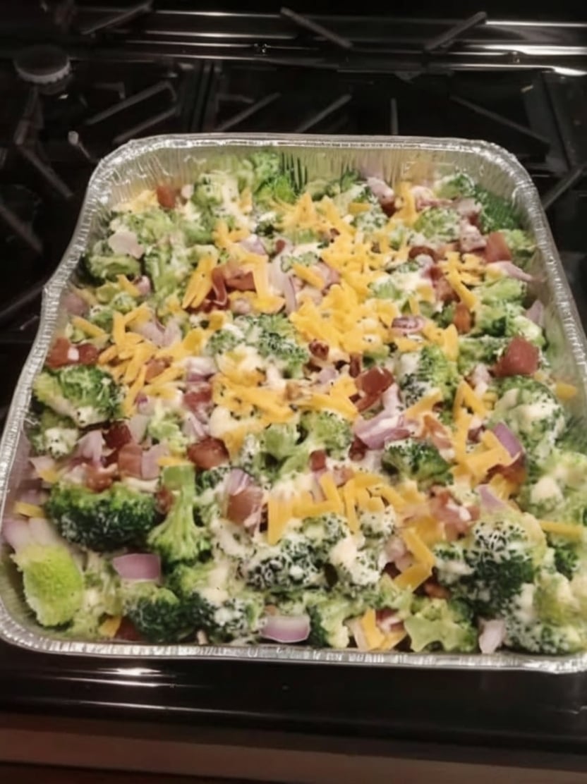 Crisp broccoli florets tossed with bacon, sharp cheddar, red onion, and a creamy sweet-tangy dressing. This easy summer side dish and potluck favorite is make-ahead friendly and always disappears fast at cookouts and BBQs.
