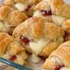 Buttery crescent dough wrapped around melty brie and sweet jam. These easy holiday appetizers and game day snacks look gourmet but come together in minutes — the ultimate quick party food that always disappears first.