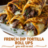 Golden, crispy French Dip Tortilla Roll Ups filled with thinly sliced roast beef and gooey melted provolone cheese, cut in half to reveal the cheesy, savory center. Served on a rustic wooden platter with a small bowl of hot au jus for dipping and garnished with fresh parsley. Photographed in warm natural light, showcasing the crunchy tortilla, tender beef, and melty cheese for an irresistible comfort food appetizer or quick family dinner.