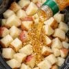Slow Cooker Italian Herb Potatoes made with tender red or yellow potatoes coated in zesty Italian salad dressing and herbs. The potatoes are cooked until fork-tender while still holding their shape, then served warm with flavorful dressing and herbs coating each piece. A simple, rustic side dish perfect for a comforting family dinner.