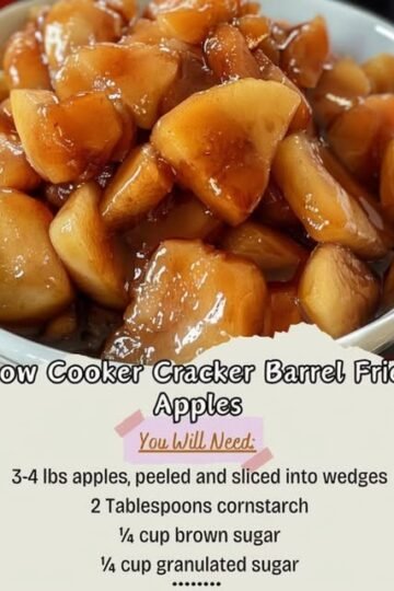 Slow cooker fried apples made with tender apple wedges coated in a glossy cinnamon-brown sugar caramel sauce, served warm in a bowl.