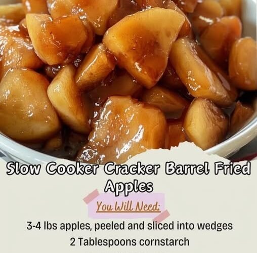 Slow cooker fried apples made with tender apple wedges coated in a glossy cinnamon-brown sugar caramel sauce, served warm in a bowl.