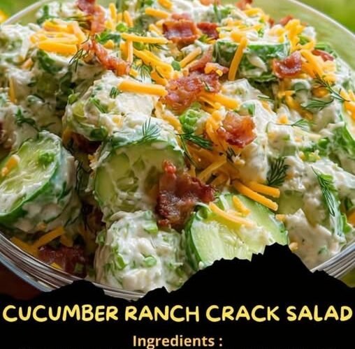 A creamy cucumber ranch salad with thinly sliced cucumbers, red onion, crispy bacon, shredded cheddar cheese, and fresh herbs, served chilled in a bowl.