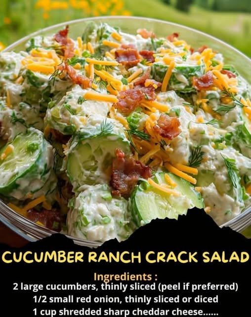 A creamy cucumber ranch salad with thinly sliced cucumbers, red onion, crispy bacon, shredded cheddar cheese, and fresh herbs, served chilled in a bowl.