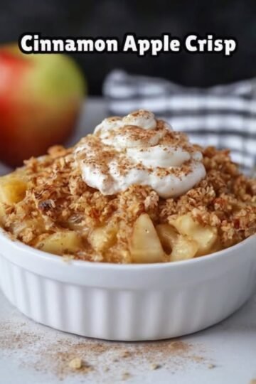 A warm cinnamon apple crisp made with tender sliced apples, topped with a golden, buttery oat crumble and lightly dusted with cinnamon.