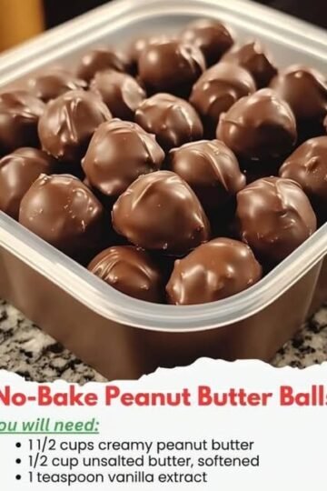 No-bake peanut butter balls coated in glossy chocolate, arranged closely together on a plate, with creamy peanut butter centers and a smooth chocolate shell.