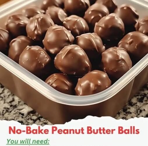 No-bake peanut butter balls coated in glossy chocolate, arranged closely together on a plate, with creamy peanut butter centers and a smooth chocolate shell.