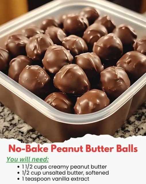 No-bake peanut butter balls coated in glossy chocolate, arranged closely together on a plate, with creamy peanut butter centers and a smooth chocolate shell.