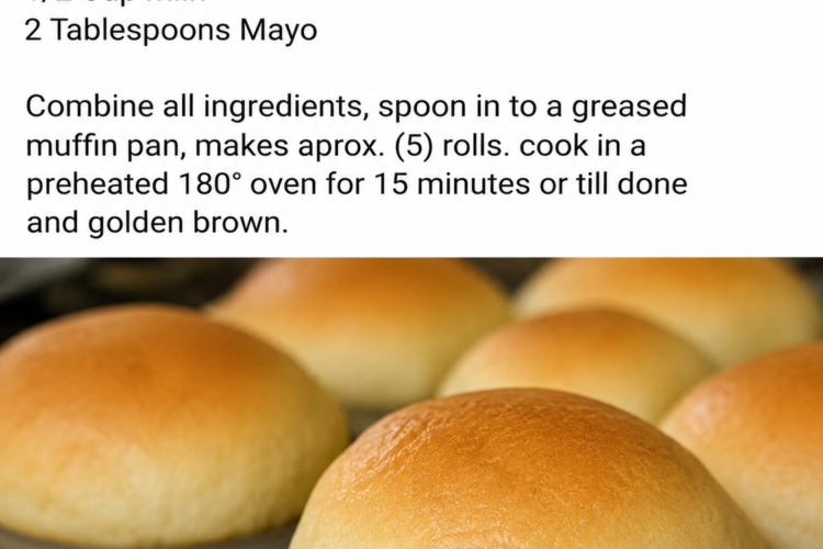 Freshly baked no-yeast mayo rolls with golden, lightly browned tops and soft, fluffy interiors, served warm in a rustic bread basket with melted butter. One roll is split open to reveal its tender, pillowy crumb, while the others are brushed with butter and arranged on a wooden farmhouse table in warm natural light for a cozy homemade dinner presentation.