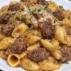 Creamy paprika steak shells featuring tender, seared steak bites and pasta shells coated in a rich, velvety cream sauce. The dish is flavored with smoked paprika, garlic, beef broth, and Parmesan, then finished with fresh parsley for a hearty, comforting dinner.