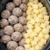 Slow Cooker Meatball and Potato Stew with tender frozen meatballs and cubed russet potatoes simmered in a rich, creamy mushroom and onion gravy. The hearty stew is served hot with the meatballs and fork-tender potatoes coated in savory sauce, making it an easy and comforting weeknight dinner