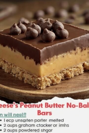 No-bake peanut butter bars with a firm, buttery graham cracker and peanut butter base topped with a smooth, glossy layer of melted chocolate and peanut butter. The bars are cut into neat squares and served chilled, creating a rich, creamy chocolate-peanut butter dessert with classic Reese’s-style flavor.