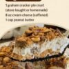 A creamy no-bake peanut butter pie topped with whipped cream and crushed Butterfinger candy pieces, set in a golden graham cracker crust and garnished with extra candy crumbs.
