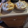A classic homemade chocolate cream pie with a rich, smooth chocolate filling in a flaky crust, topped with a generous layer of golden-brown meringue.