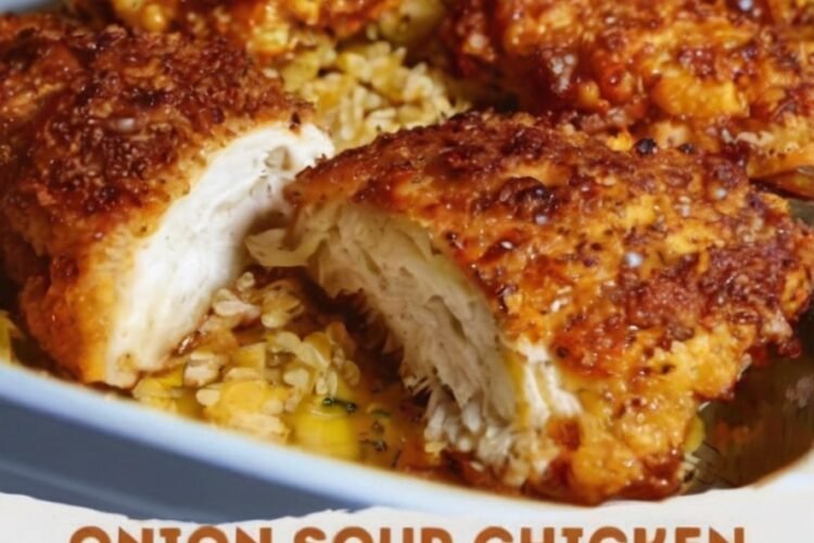 Juicy baked chicken over creamy onion-soup rice. A simple one-dish dinner with golden tops and comfort-food flavor.