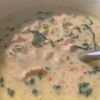 Creamy chicken gnocchi soup with tender chicken, soft potato gnocchi, spinach, carrots, celery, and herbs in a rich, comforting broth.
