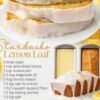 Moist lemon loaf cake layered with sweet white lemon glaze, showing a bright yellow crumb and fresh lemon slices beside it.