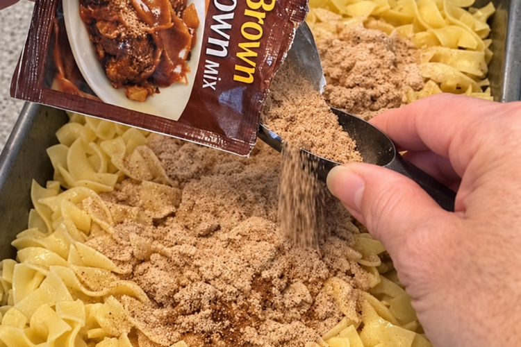 Uncooked egg noodles bake right in rich brown gravy — a cozy, old-fashioned one-dish weeknight dinner.