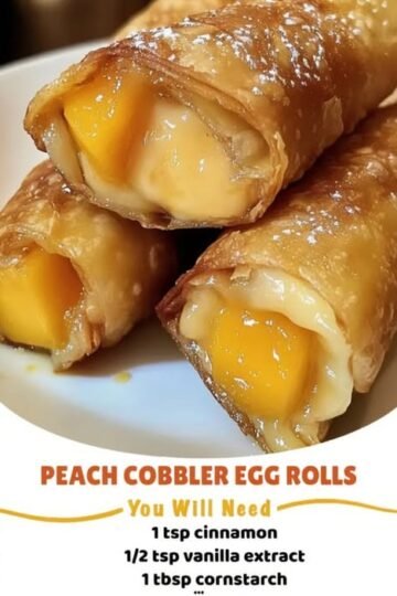 Crispy fried egg rolls filled with warm, jammy cinnamon-sugar peaches. Peach cobbler in a shatteringly crisp, handheld package, dusted with powdered sugar.