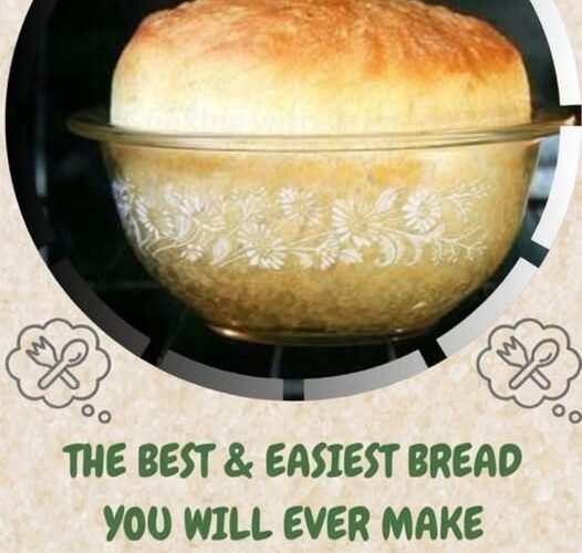 A beautifully risen homemade loaf of bread with a golden-brown crust and soft, fluffy interior, baked in a decorative glass bowl.