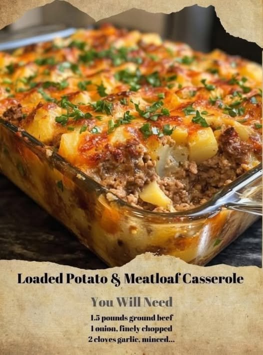 A hearty loaded potato and meatloaf casserole layered with seasoned ground beef, tender potatoes, melted cheddar cheese, and fresh parsley, baked until golden and bubbling.