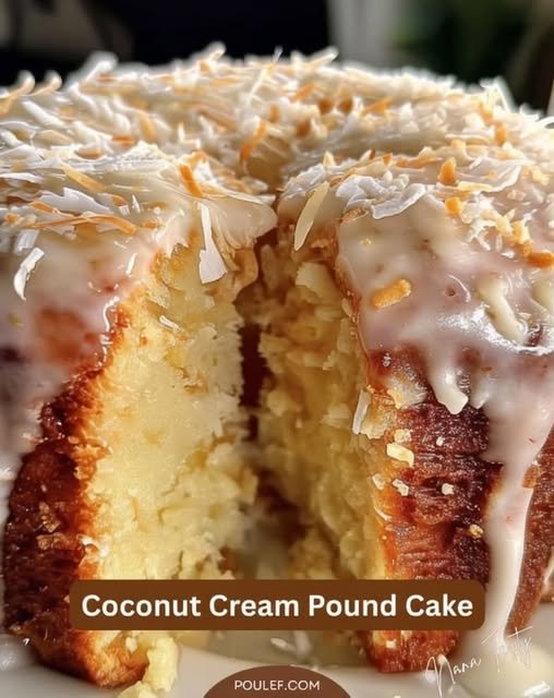 A moist coconut cream pound cake with a tender, buttery crumb, covered in creamy coconut glaze and generously sprinkled with shredded coconut for a rich, tropical finish.