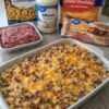 A creamy, cheesy beef and cavatappi pasta casserole made with Alfredo sauce, ground beef, sharp cheddar, and a rich, golden cheese topping, baked until bubbly and delicious