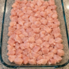 Diced chicken breast baked in cream of chicken soup, sour cream, onion mix, and cheddar