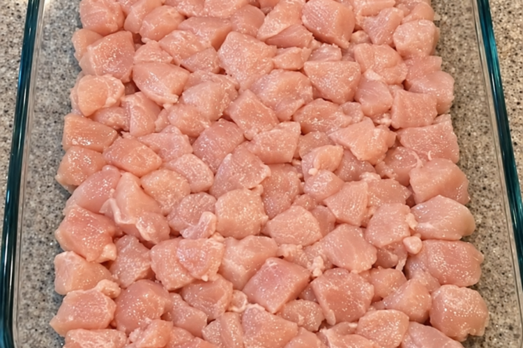 Diced chicken breast baked in cream of chicken soup, sour cream, onion mix, and cheddar
