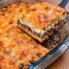 Biscuit crust, seasoned ground beef, sour cream, and cheddar since 1979