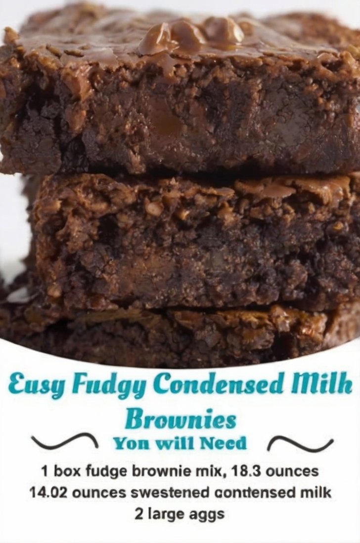 A stack of thick, dark chocolate brownies with deeply fudgy centers, slightly crackled tops, and rich chocolate pieces visible throughout