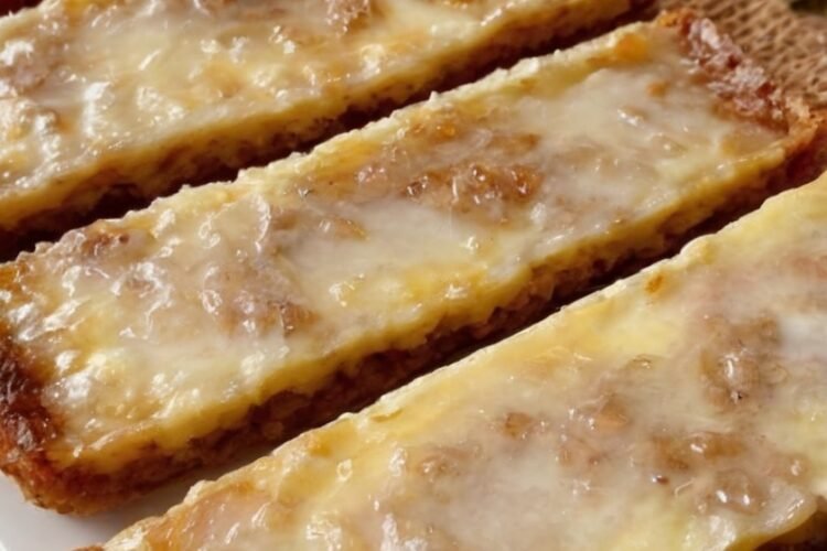 Chewy, honey-warm German spice bars with a glossy orange glaze. A one-pan shortcut to the classic Christmas treat — and at their absolute best 1–2 weeks after baking.