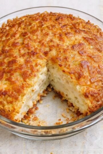 A 1958 magazine classic — golden, crispy potato pie with a tender layered interior, made from just hash browns, sour cream, cheddar, and butter.