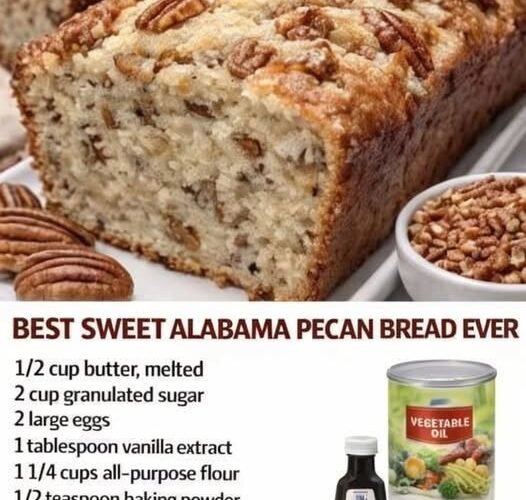 A freshly baked Sweet Alabama Pecan Bread with a golden-brown, slightly crisp crust, a soft, moist, buttery crumb packed with chopped pecans, and crunchy pecan halves scattered across the top.