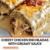 Creamy cheesy chicken enchiladas wrapped in soft flour tortillas, smothered in a rich white sauce, topped with melted golden cheese, and finished with a spoonful of chunky red salsa. The Cooking Twins
