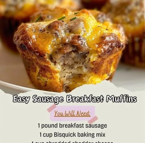 Golden-brown sausage breakfast muffins packed with savory breakfast sausage, fluffy egg, and melted cheddar cheese, with a tender biscuit-like center and crisp, cheesy tops. lanascooking.com