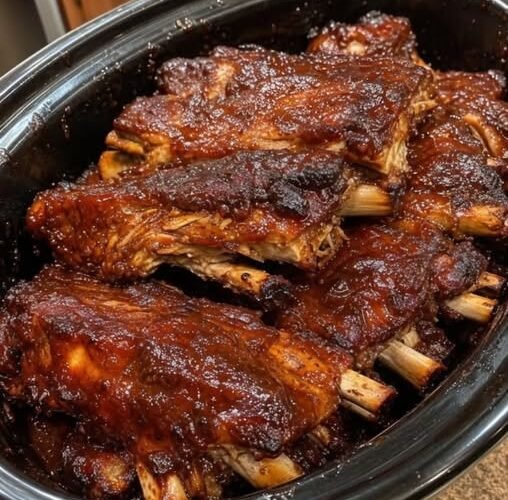 Tender, slow-cooked BBQ Beef Ribs coated in a thick, rich, glossy barbecue sauce that clings to every bite. 🍖🔥 With their deep caramelized color and juicy, meaty texture, these ribs are a comforting family favorite perfect for Sunday dinner!